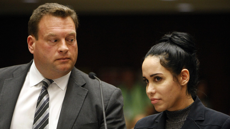Natalie Suleman sitting in court with her lawyer