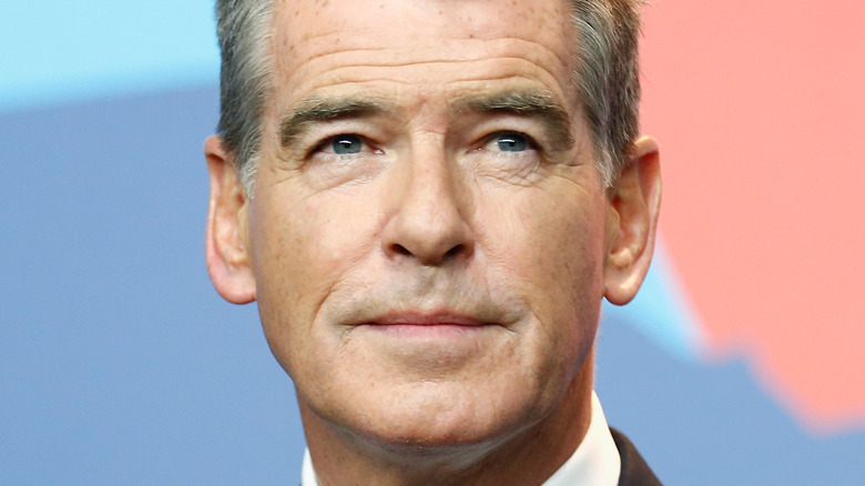 Pierce Brosnan smiling softly 