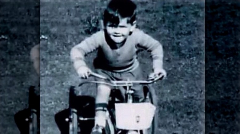 Pierce Brosnan as a child riding his bike