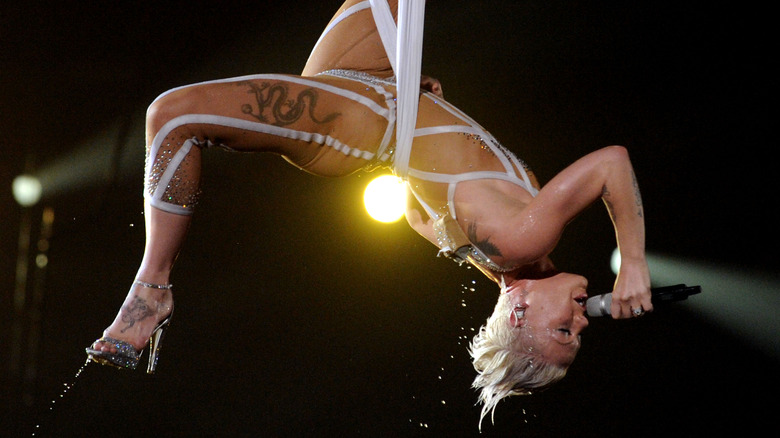 Pink performing in midair at the Grammy Awards