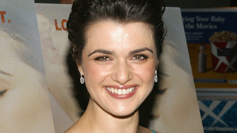 Rachel Weisz in front of the poster of 'The Constant Gardener.'