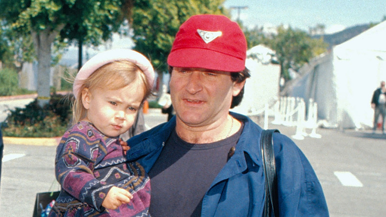 Robin Williams holding daughter Zelda when she was a toddler