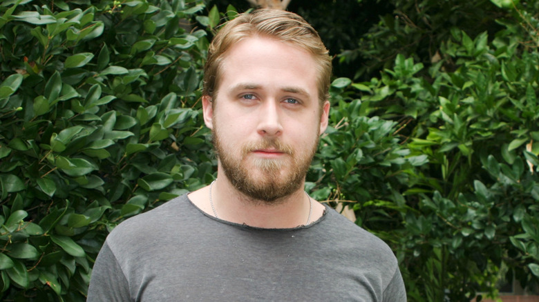 Ryan Gosling posing in front of trees in 2007