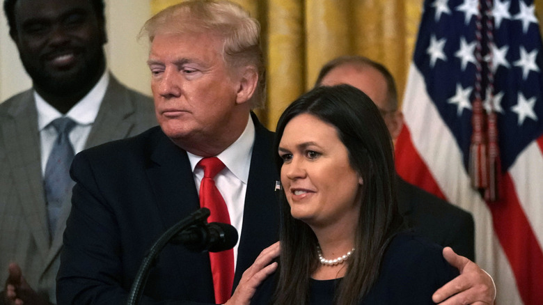 Donald Trump and Sarah Huckabee Sanders speaking together