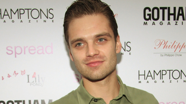 Young Sebastian Stan smirking