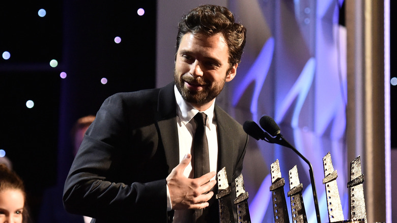 Sebastian Stan onstage accepting award