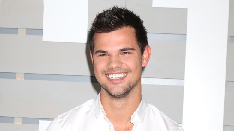 Taylor Lautner grinning