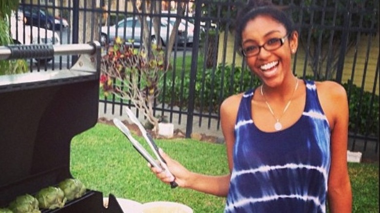 Tayshia Adams grilling