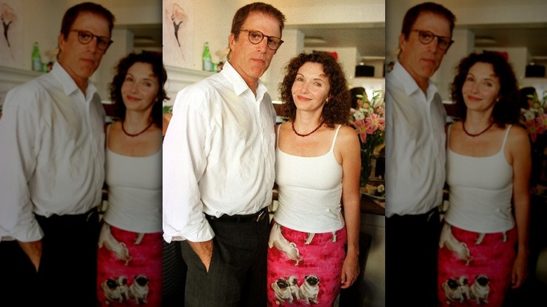 Ted Danson looking serious with smiling Mary Steenburgen