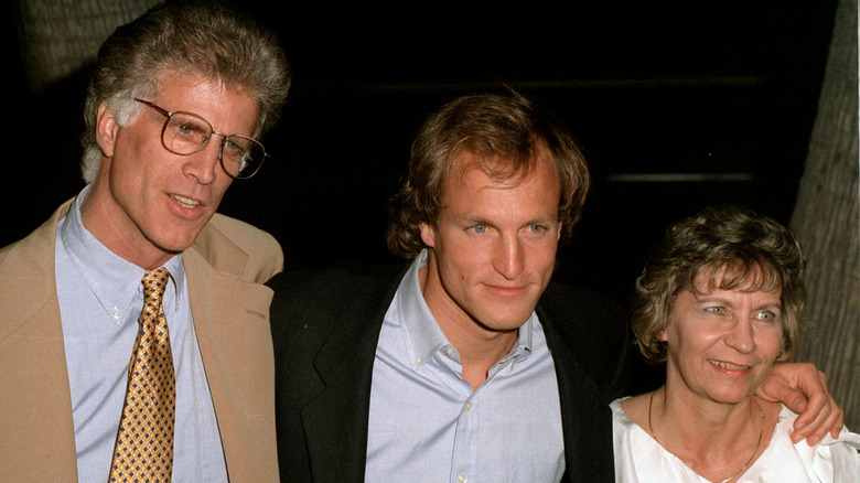 Ted Danson posing with smiling Woody Harrelson