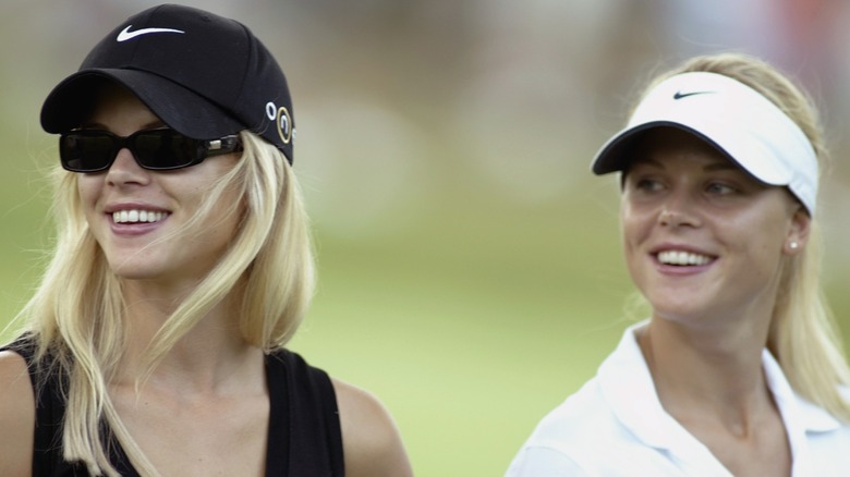 Elin and Josefin Nordegren enjoying a sports match