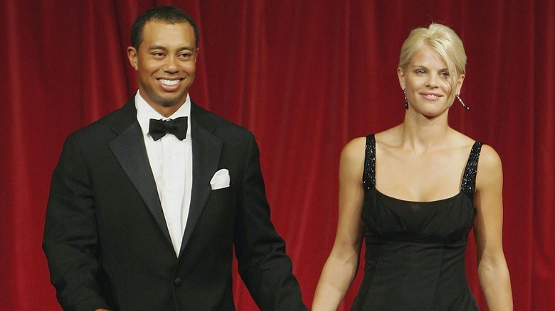 Elin Nordegren and Tiger Woods smiling
