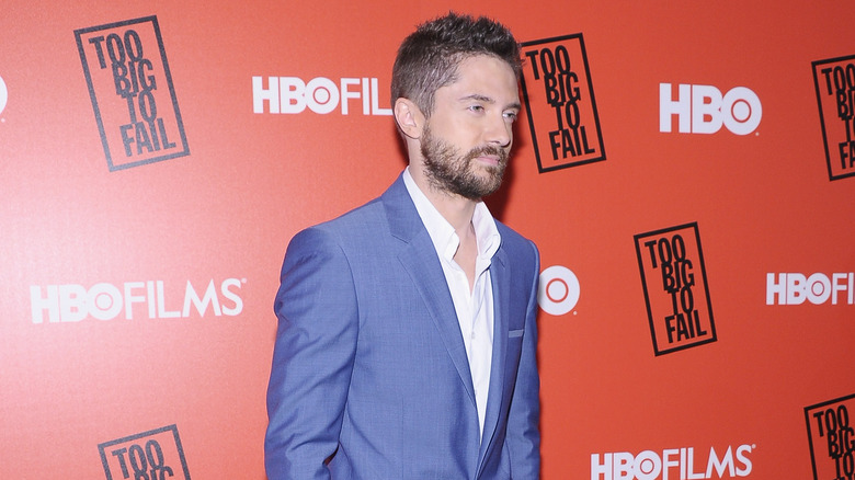 Topher Grace wearing blue blazer