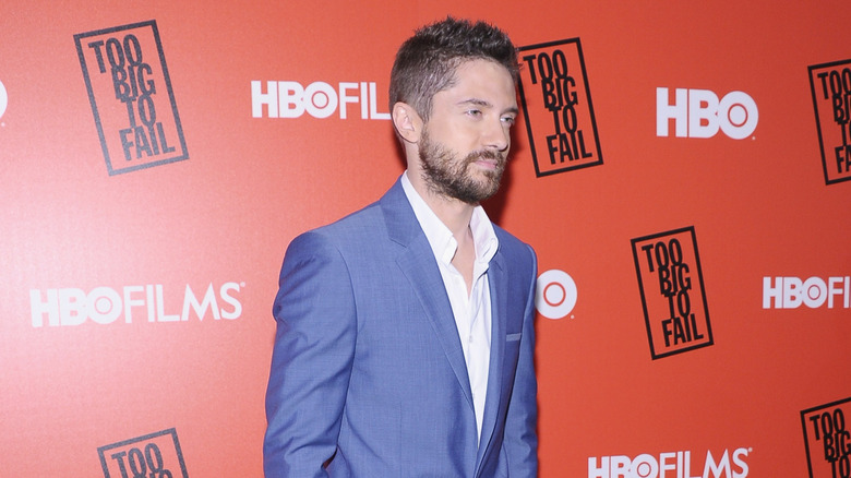 Topher Grace wearing blue blazer
