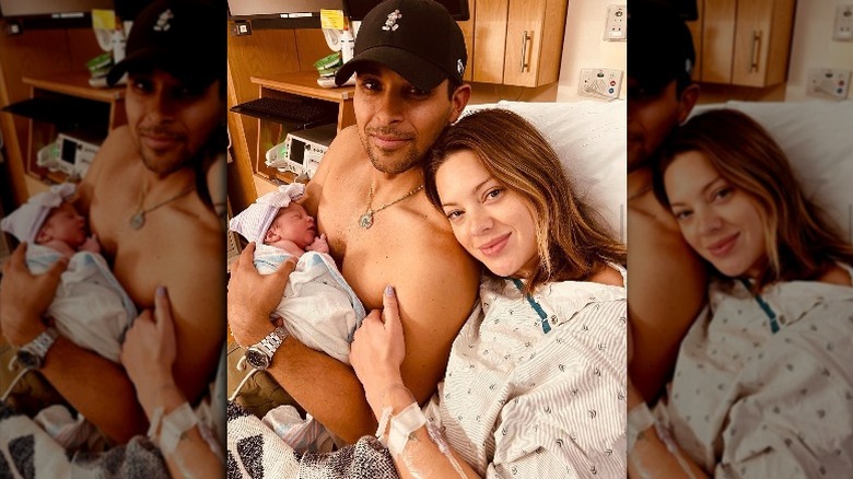 Wilmer Valderrama, holding his newborn at the hospital with Amanda Pacheco