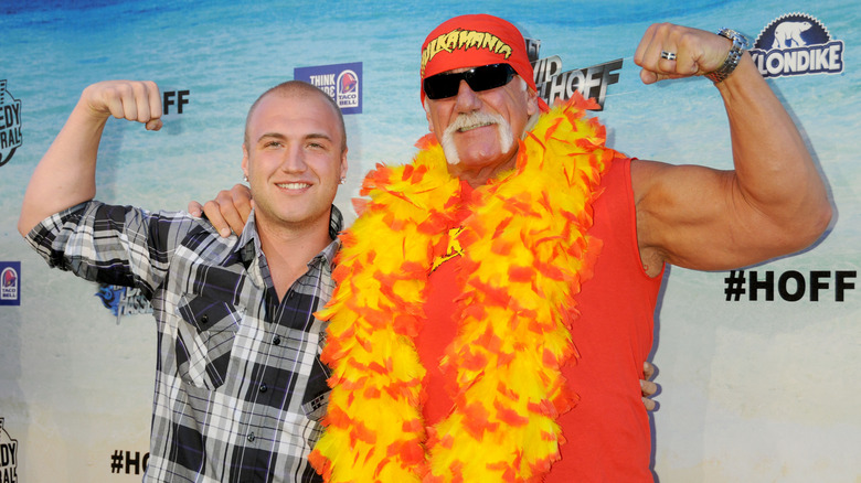 Hulk Hogan Nick Hogan pose together red carpet