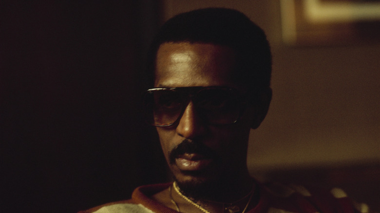 Ike Turner in striped shirt