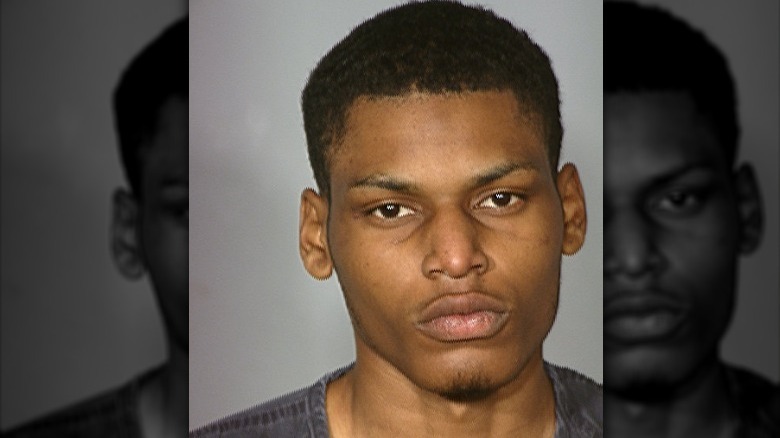 Grtis Ivey posing for mugshot