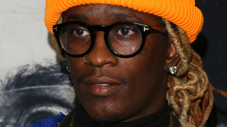 Young Thug wearing glasses