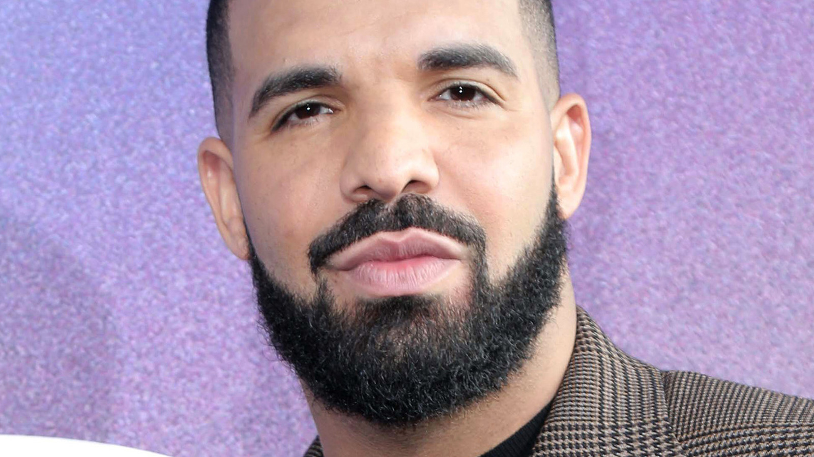 The True Meaning Behind 'Champagne Poetry' By Drake