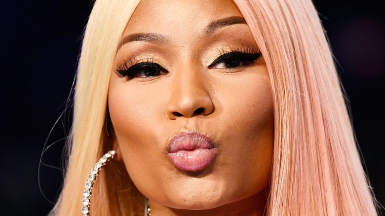 Nicki Minaj blowing a kiss