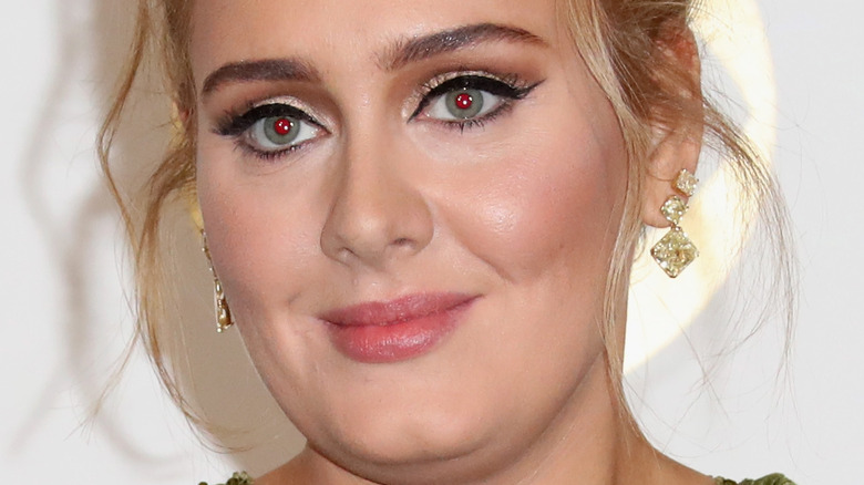 Adele posing at the Grammy Awards