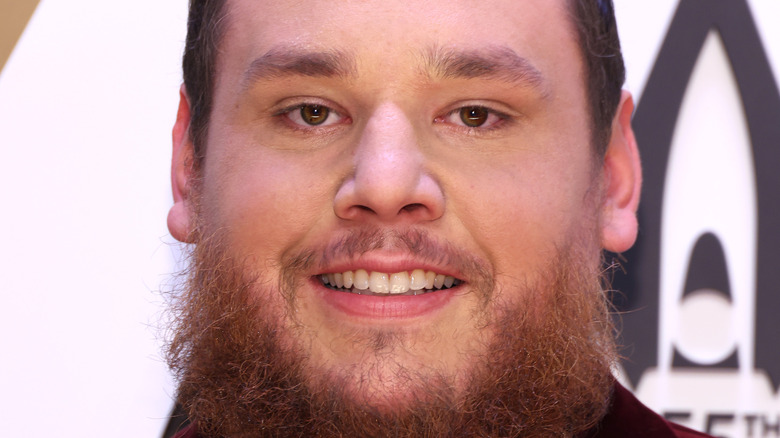 Luke Combs grinning