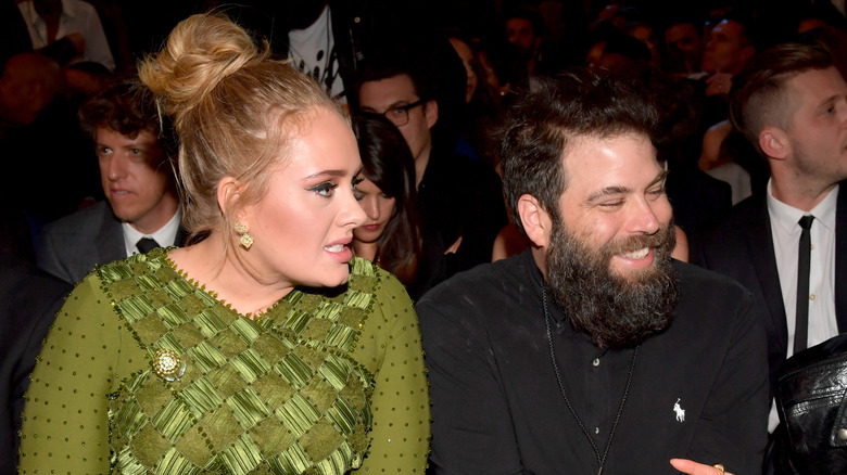 Adele sits beside ex-husband