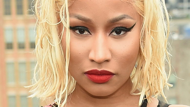 Nicki Minaj with red lipstick and blonde hair