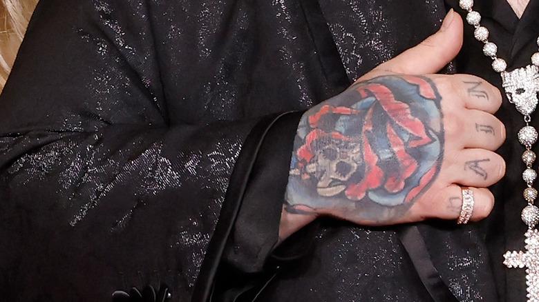 Jelly Roll's hand rose tattoo