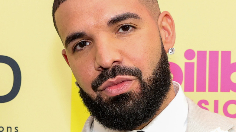 Drake looking at camera with serious expression