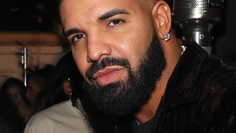 Drake posing