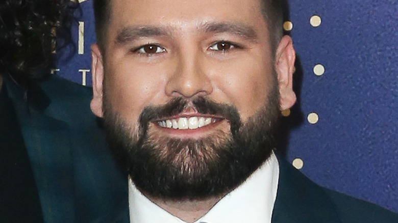 Dan and Shay smiling on the red carpet