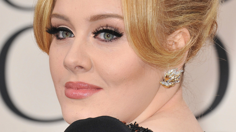 Adele posing in 2013 