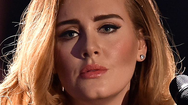 Adele with a serious expression