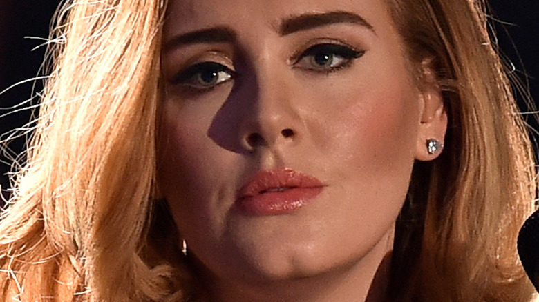Adele performing at an event 