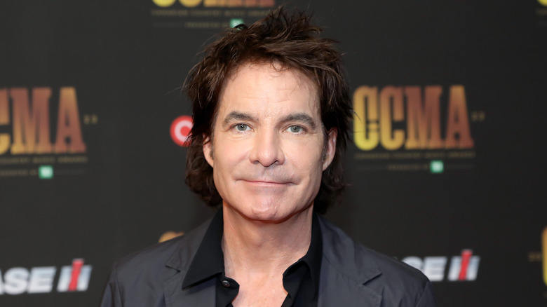 Pat Monahan smirking