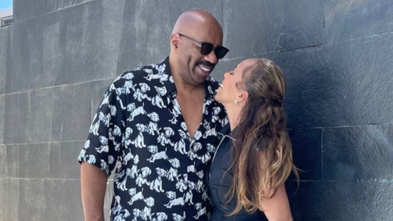 Steve Harvey and Marjorie Harvey smiling