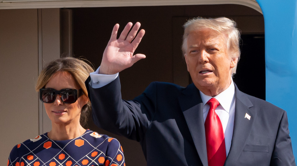 Melania and Donald Trump wave