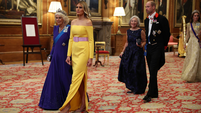 Melania Trump and Queen Camilla walking into the U.S. State Banquet