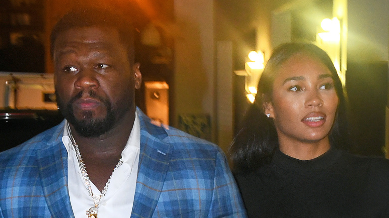 50 Cent and Jamira Haines walking down the street