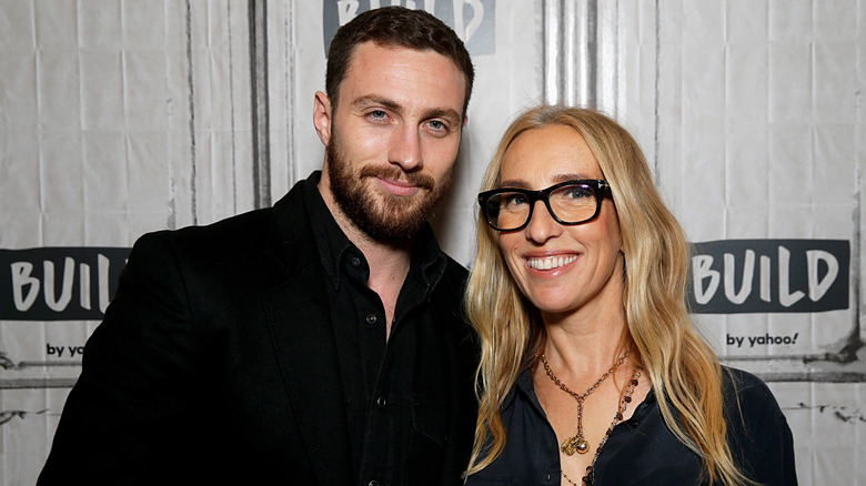 Aaron Taylor-Johnson and Sam Taylor-Johnson smiling 