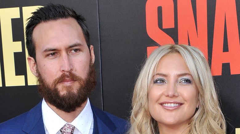 Kate and Danny Fujikawa pose at an event