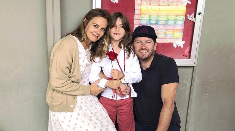 Alicia Silverstone and Christopher Jarecki pose with Bear