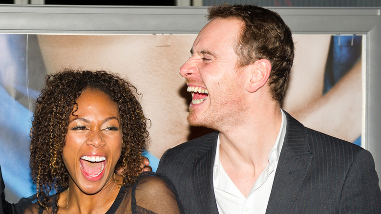Nicole Beharie and Michael Fassbender laughing
