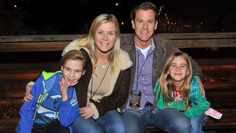 Alison Sweeney, husband David Sanov and children Benjamin and Megan posing for photo at Knott's Merry Farm