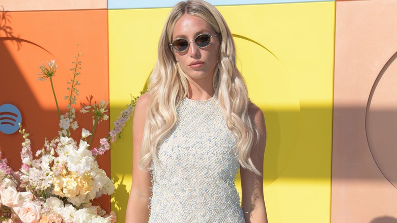 Alix Earle wearing shades