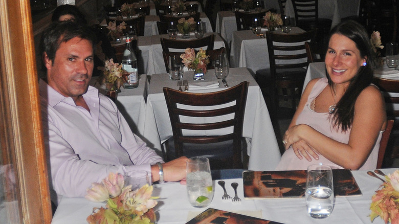 TJ Earle and Ashley Dupré seated