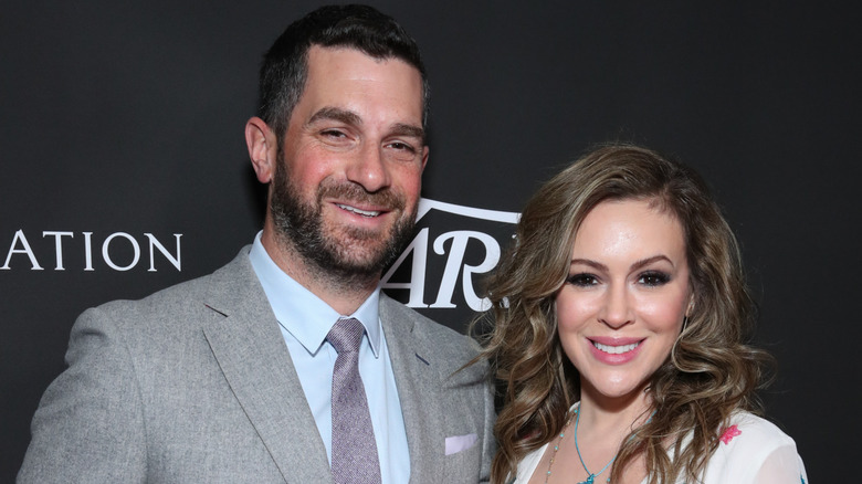 Alyssa Milano and her husband David Bugliari at event