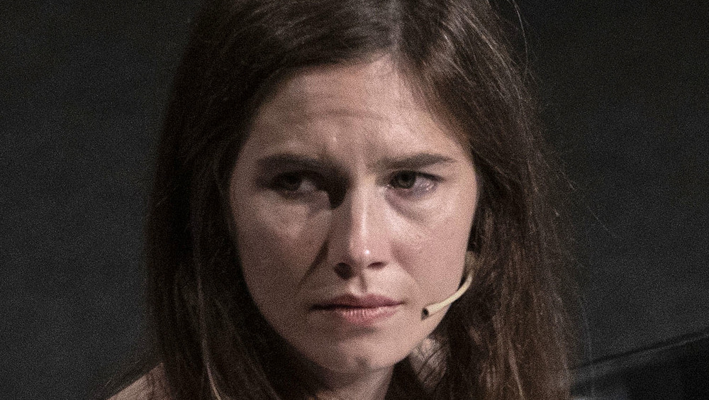 Amanda Knox looking serious